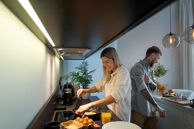A bright, modern kitchen with an energy-efficient refrigerator, LED lighting under cabinets, and a family cooking together, illustrating household energy savings.