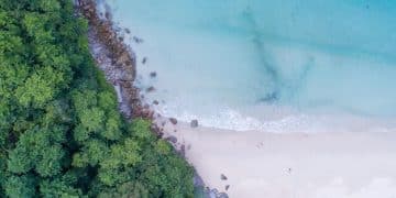 Sustainable Coastal Tourism: Reducing Environmental Footprint - Cover Image