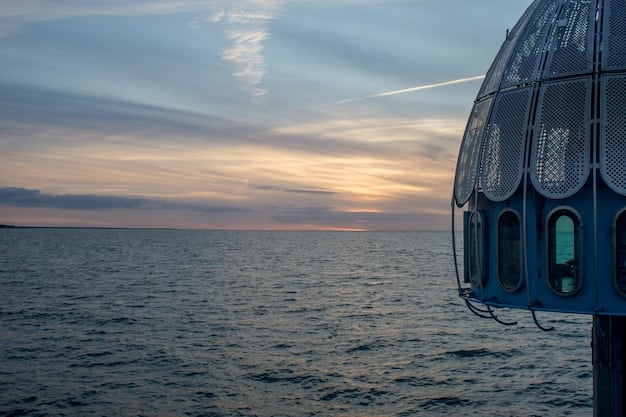 A calm ocean scene with a research vessel deploying scientific equipment, symbolizing data collection and conservation efforts.