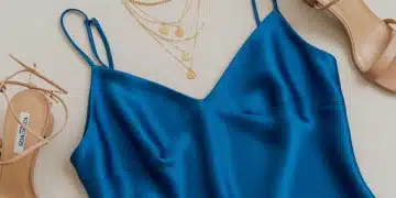 Summer Evening Wear 2025: 4 Effortless Elegance Pieces Luxurious silk slip dress with delicate gold jewelry