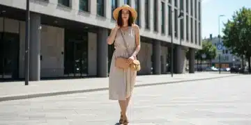 Stylish woman in a versatile summer dress, embodying practical summer wardrobe solutions